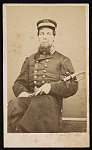 [Acting Carpenter Richard Ratchford of U.S. Navy in uniform with sword]