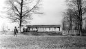 Unidentified building and man