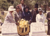 Members of the "Ten Times One Is Ten" Club placing a wreath on the graves of George W. and Harper Councill Trenholm.