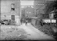 Two African American men, east side tenements, Pearl Street, Hartford