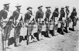 24th Infantry on campaign duty lined up with an experimental blanket roll they were testing for the U.S. Army.