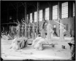 Torch bearers' statues in studio