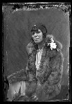 Portrait of a woman in fur coat and cloche hat