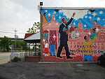 Sidewalk mural showing Dr. Martin Luther King. He lived for three years in this community in Chester, Pennyslvania. He ministered under the mentorship of J. Plus Barbour. He graduated from Crozer Theological Seiminary