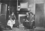 [An African American family; Reading books.]