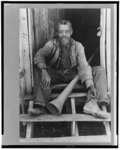 Old Negro (former slave) Willis Winn with horn with which slaves were called, near Marshall, Texas