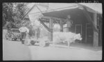 This Negro client of Dixon's Mill community, Marengo County, Alabama, had come to town for groceries and feed with his steer hitched to his homemade wagon. The cost of this wagon was effort only, it having wooden axles, wooden wheels and wooden pins