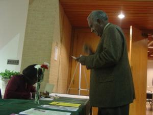 Man at welcome table