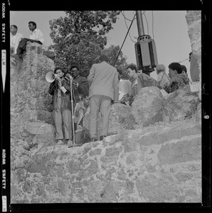 Group of people addressing the crowd at rally in Franklin Park