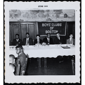 "Boy of the Year," Oswald Gooden seated at the head table with his father and other guests at the award ceremony