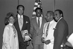 Thumbnail for Black Enterprise Magazine luncheon participants posing together, Los Angeles, 1987