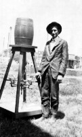 County Superintendent Thomas. Showing his drinking fountain for County Schools