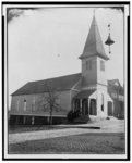 [Exterior view of church with group of African American men standing on steps in Georgia]