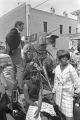 CBS camera crew filming Martin Luther King, Jr.'s funeral from the back of a pickup truck.