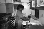 Clemon's restaurant employee making biscuits, Los Angeles, 1984