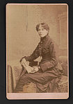 [Josephine A. Silone Yates, educator and activist, seated before studio backdrop]