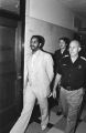 Deputies escorting Anthony Ray Hinton to the courtroom during his capital murder trial in Birmingham, Alabama.