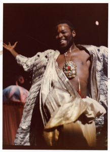 Performance picture close-up of a happy man with his arms outstretched]. [color photoprint