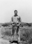 Louis Love standing in field