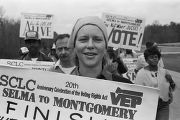 Marty Collier and other marchers during the 20th anniversary reenactment of the Selma to Montgomery March, probably in rural Dallas or Lowndes County, Alabama.