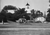 Helicopter on the lawn beside Dexter Avenue Baptist Church in Montgomery, Alabama, during the takeover of radio station WAPX by Black Muslims.