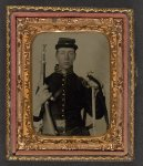 [Unidentified soldier in Union cavalry uniform with percussion cap pistol carbine, attached stock, and cavalry saber]