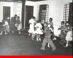 Children and teens dancing at a party