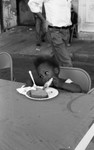 Friends feeding friends, Los Angeles, 1986