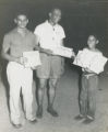 Two African American Men and Boy Holding Certificates