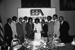 Black Business Association members posing together with awards, Los Angeles, 1982