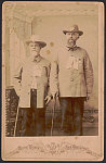 [Two unidentified Civil War veterans wearing Pickett Buchanan and Lee Monument badges]