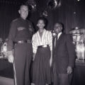 Film negatives of policeman Hank Brush, Boots Wade, and Harold "Stumpy" Cromer at the Moulin Rouge slots, July 30, 1955