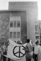 Anti-war demonstrators gathering for a peace march through downtown Birmingham, Alabama.