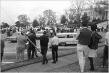 Crowd watching a Ku Klux Klan rally in front of the Capitol in Montgomery, Alabama.