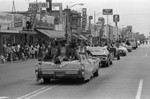 Cinco de Mayo Parade participants pass along a street in Compton, Los Angeles, 1973