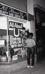 Woman posing in front of a beauty shop, Los Angeles, 1984