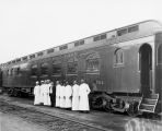 Chefs and waiters employed by a train company.