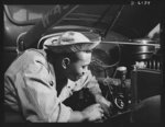 Fort Knox. Negro mechanics. A good ignition job on an army truck. This Negro soldier, who serves as truck driver and mechanic at Fort Knox, Kentucky, plays an important part in keeping army transport fleets in operation