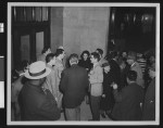 Group of citizens await the release of "Smith Act" 10 defendants, Dec. 1951, Federal Building, downtown Los Angeles