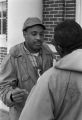 Scott B. Smith of SNCC speaking with John Davis of SCLC, in front of the Barbour County courthouse in Eufaula, Alabama.