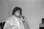 Beulah Baptist Church member speaking at a microphone, Los Angeles, 1989