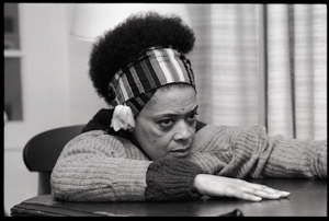 Toni Cade Bambara: portrait slumped on a table