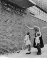 Children outside Laura Wheeler Waring public school