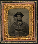 [Unidentified soldier in Union musician uniform in front of painted backdrop showing military camp]