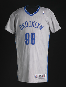 Basketball jersey for Brooklyn Nets worn by Jason Collins, signed by teammates