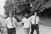 Sergeant Clifford Vasser and Lieutenant Doug Acker escorting Anthony Ray Hinton to the city jail in Bessemer, Alabama.