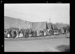 Negro flood refugees lined up and waiting for food in Forrest City, Arkansas, camp