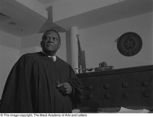 Photograph of judge L. Clifford Davis posing in his courtroom