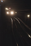 Subway train on tracks at station located at Malcolm X Blvd. at W. 125th St., Harlem, 2011