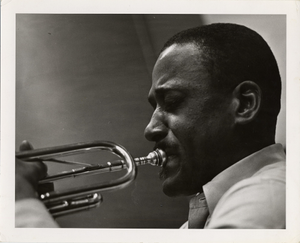 Ray Vance playing trumpet : black-and-white photoprint.